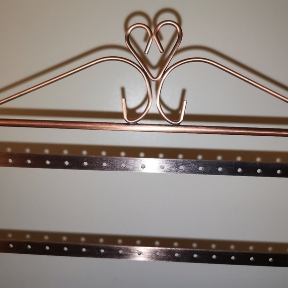 Copper tone earrings display - Picture 3 of 5